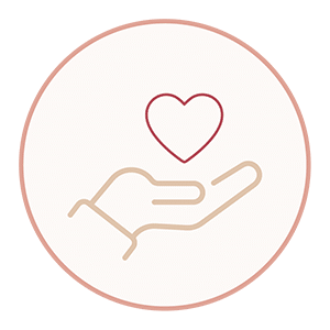 Hand holding a heart icon symbolizing caring, compassionate dental care.